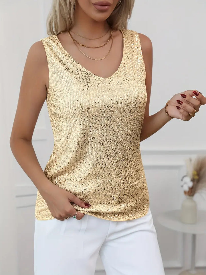 Sparkling V-neck women's top, perfect party wear for glamorous evenings.