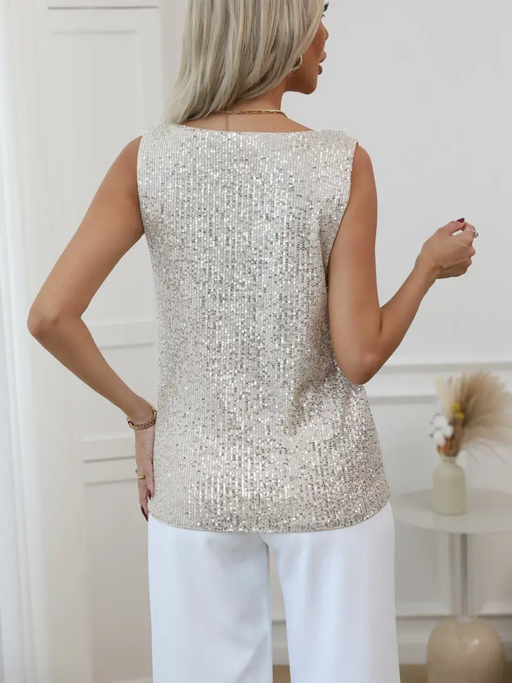 Women's long sleeve V-neck glitter top, ideal for stylish evening wear.