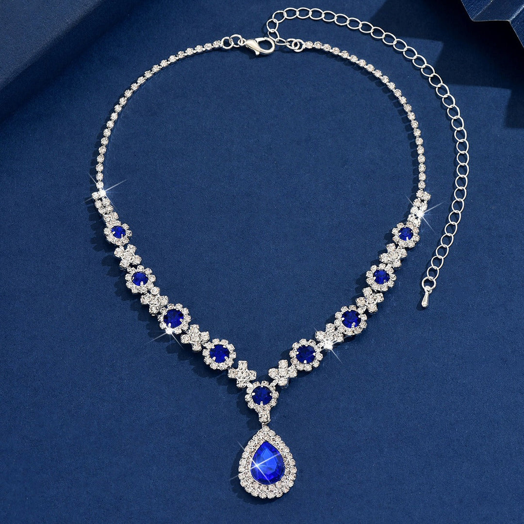 Vibrant red sparkling waterdrop cubic zirconia pendant necklace, elegant women's jewelry.