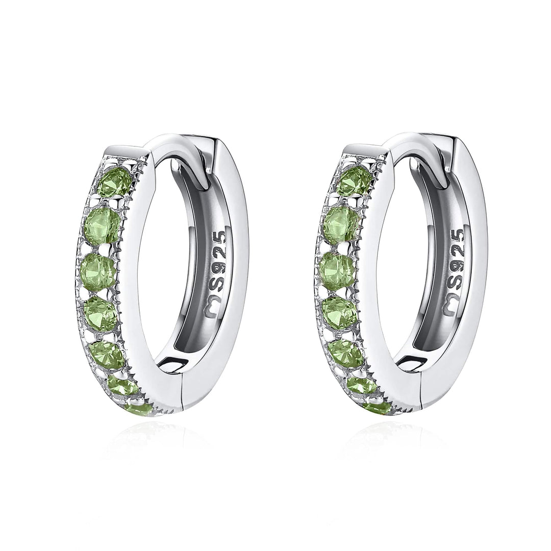Stylish silver zirconia hoops for women. Sparkling jewelry, a perfect dainty fashion accessory.