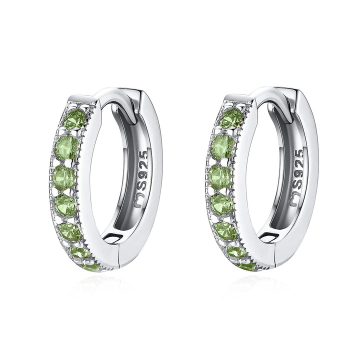 Stylish silver zirconia hoops for women. Sparkling jewelry, a perfect dainty fashion accessory.