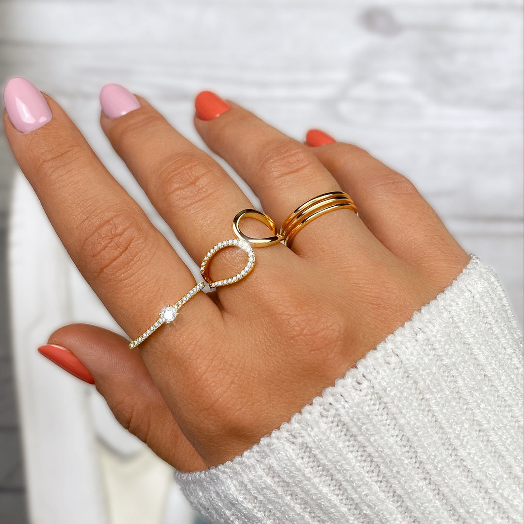 Stunning gold plated sterling silver ring with a large sparkling zirconia solitaire. A timeless & elegant women's gift.