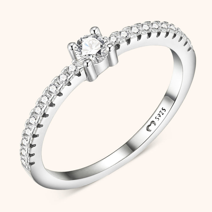 Classic women's solitaire ring featuring a sparkling zirconia gem. Gold plated sterling silver elegant jewelry.