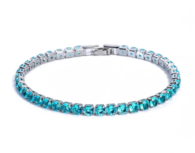 Sparkling multicolor zirconia tennis bracelet for women. Adjustable design, vibrant fashion accessory.