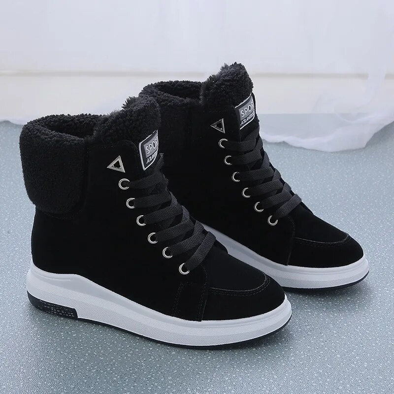 Cozy women's winter snow boots. Sporty, durable footwear for ultimate warmth & comfort in cold conditions.