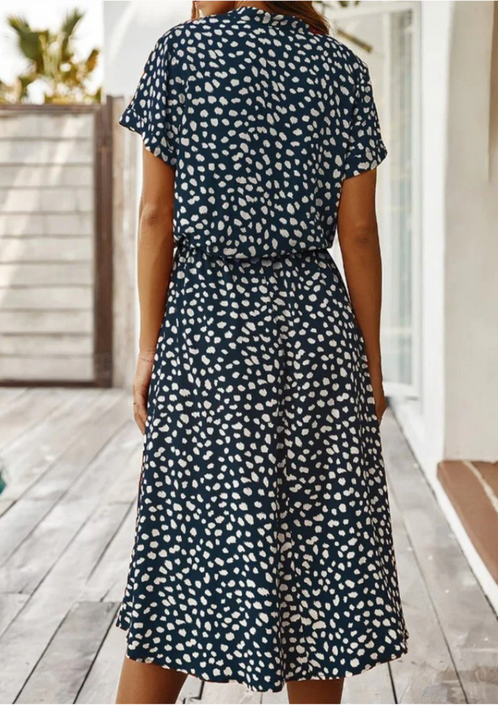 Everyday chic: Women's spotted print midi dress with a button-down front and lovely flutter sleeves.