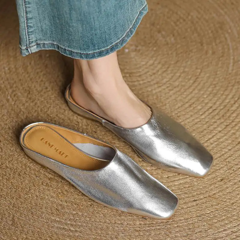 Women's fashion square-toe block heel mules. Comfortable and chic slip-on shoes, perfect for dressy casual events.