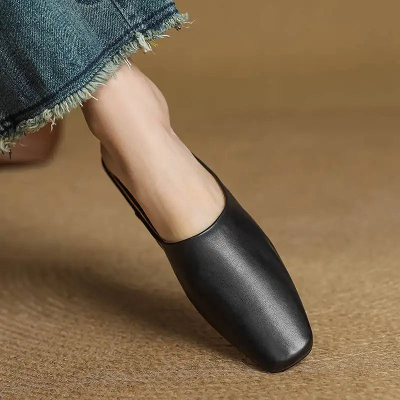 Comfortable women's square-toe block heel mules. Easy slip-on shoes for all-day wear & effortless fashion footwear.