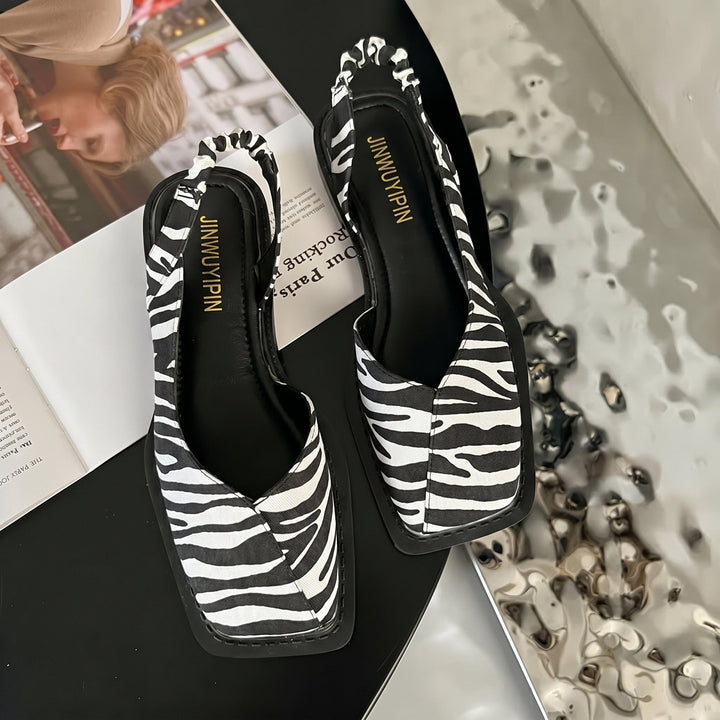 Comfortable women's square toe slingback sandals. Versatile block heel design for spring and summer fashion.