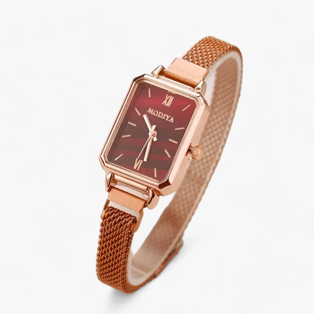Women's square watch with magnetic band, a stylish fashion accessory. Elegant and versatile design.