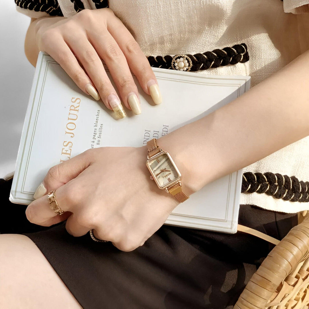 Versatile women's square watch. Stylish fashion accessory with a unique magnetic band, elegant timepiece.