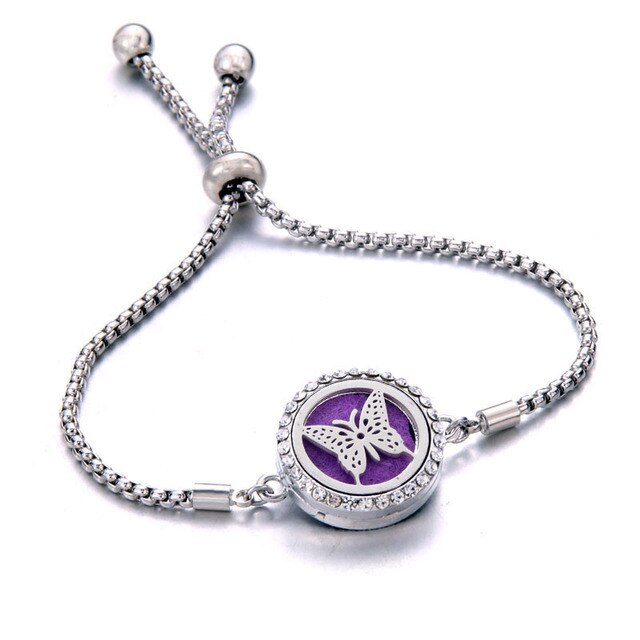 Stylish women's adjustable aromatherapy diffuser bracelet for personal essential oil application.