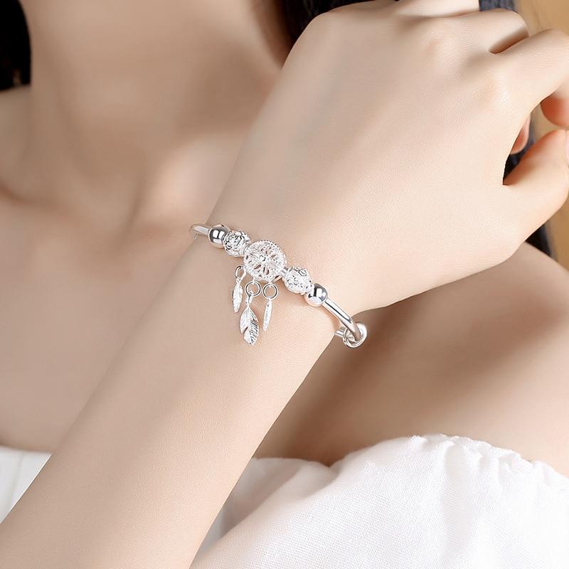 Elegant silver dreamcatcher bracelet for women, adjustable & sterling silver. A beautiful boho gift for her.