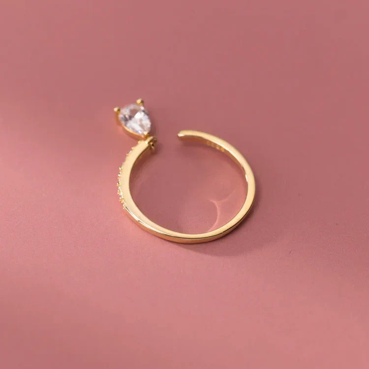 Elegant sterling silver adjustable ring with a unique water drop design, a versatile piece of women's jewelry.