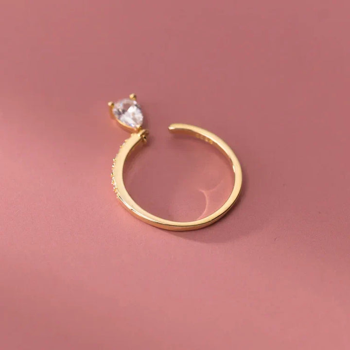 Elegant sterling silver adjustable ring with a unique water drop design, a versatile piece of women's jewelry.
