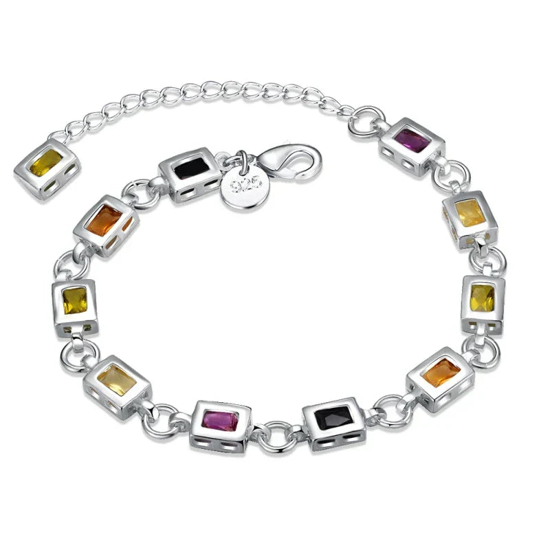 Women's sterling silver bracelet with sparkling multicoloured zircon stones. Elegant fashion accessory.