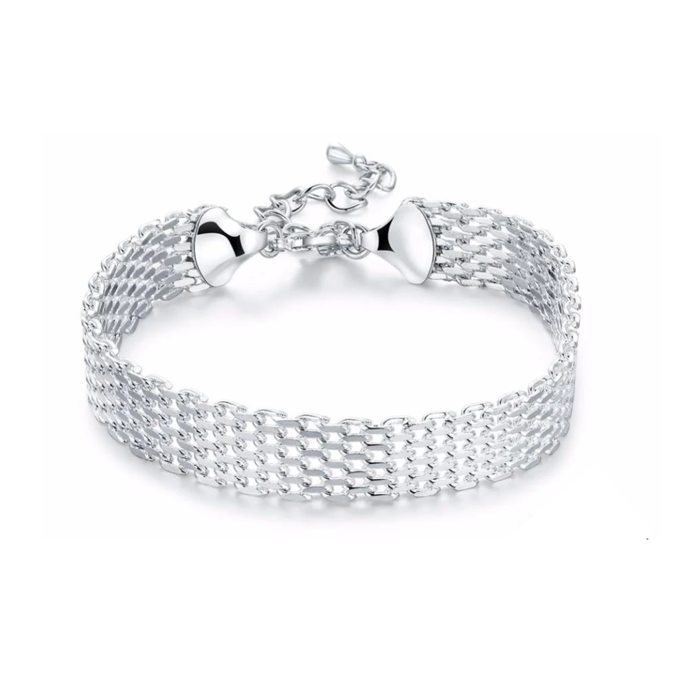 Women's sterling silver braided bracelet with lucky charm. Handcrafted, adjustable for positive energy.