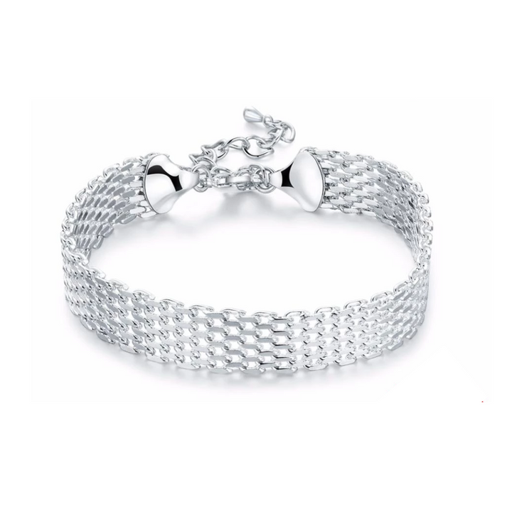 Women's sterling silver braided bracelet with lucky charm. Handcrafted, adjustable for positive energy.