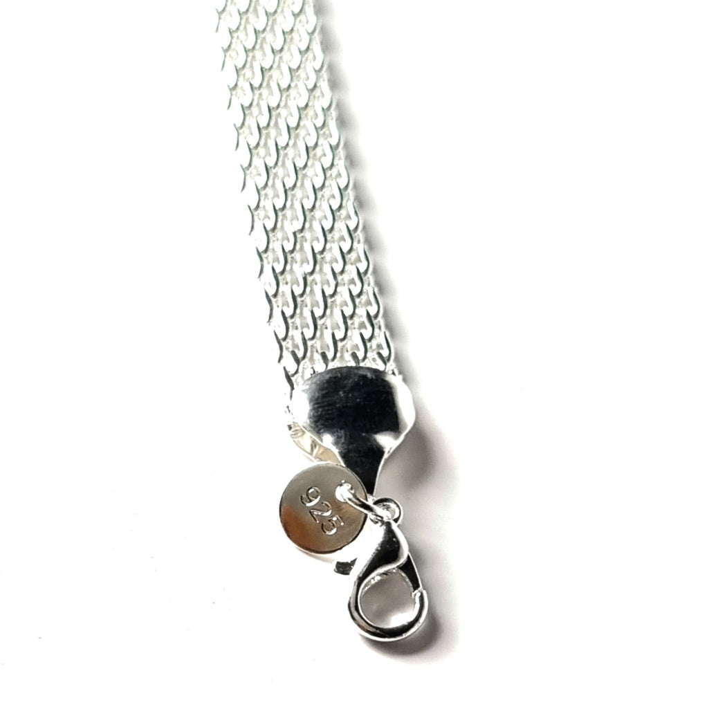 Unique handcrafted silver braided bracelet, a meaningful lucky charm gift for women seeking positivity.