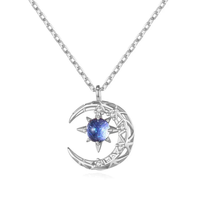 Women's sterling silver celestial necklace with delicate half moon and sparkling star pendant, adjustable chain.