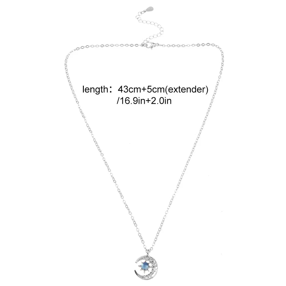 Adjustable sterling silver necklace for women with a dainty celestial half moon and star pendant. Fashion jewelry.