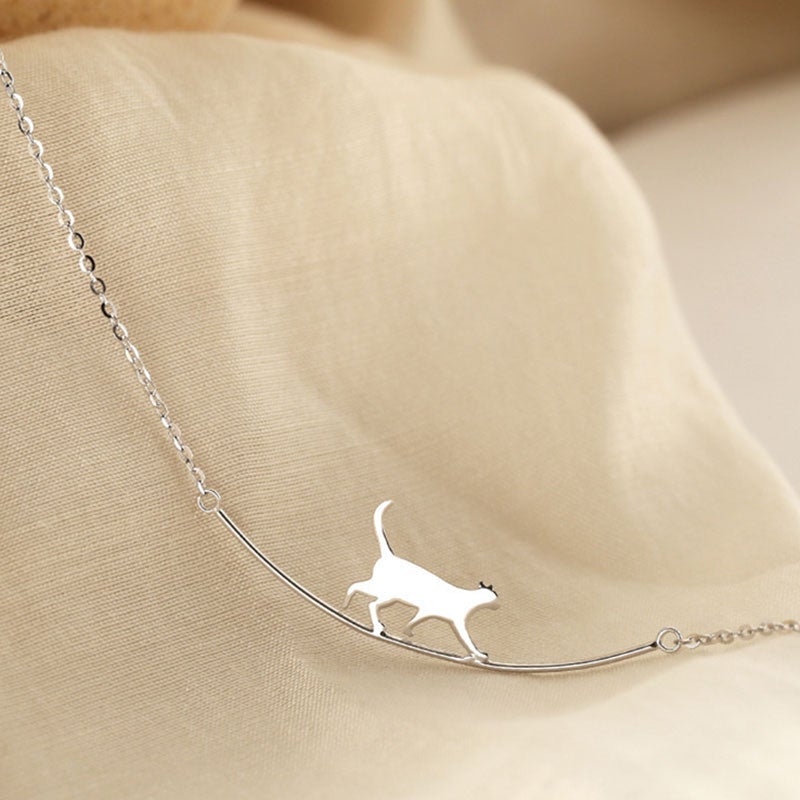 Dainty sterling silver climbing cat necklace, perfect women's animal jewelry with a feline charm.