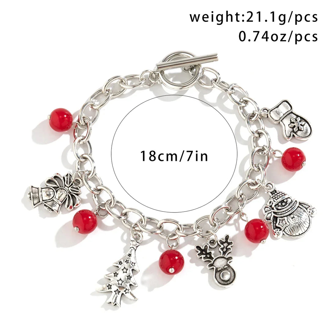 Beautiful women's festive silver charm bracelet, a must-have holiday accessory and charming Christmas gift.
