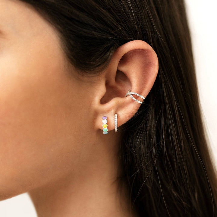 Dainty gold plated sterling silver rainbow heart drop earrings for women. Colorful and elegant jewelry.
