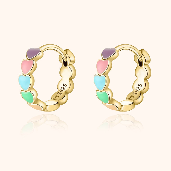 Women's elegant rainbow heart drop earrings. Sterling silver with gold plating, colorful and dainty jewelry for her.