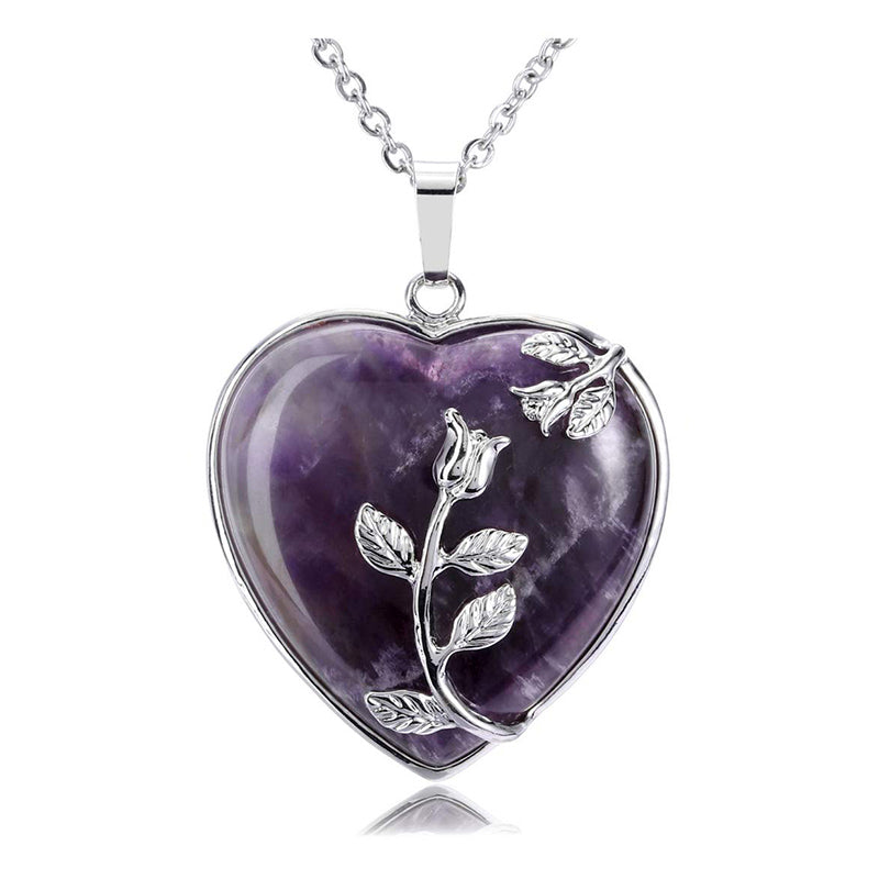 Heart-shaped rose quartz gemstone necklace for women. Sterling silver, adjustable fine jewelry.