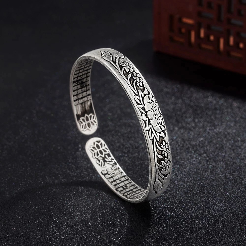 Elegant Silver Serenity Lotus Bracelet, a beautiful women's jewelry piece for tranquility.