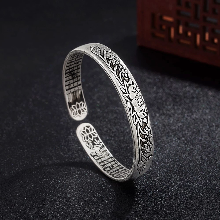 Elegant Silver Serenity Lotus Bracelet, a beautiful women's jewelry piece for tranquility.