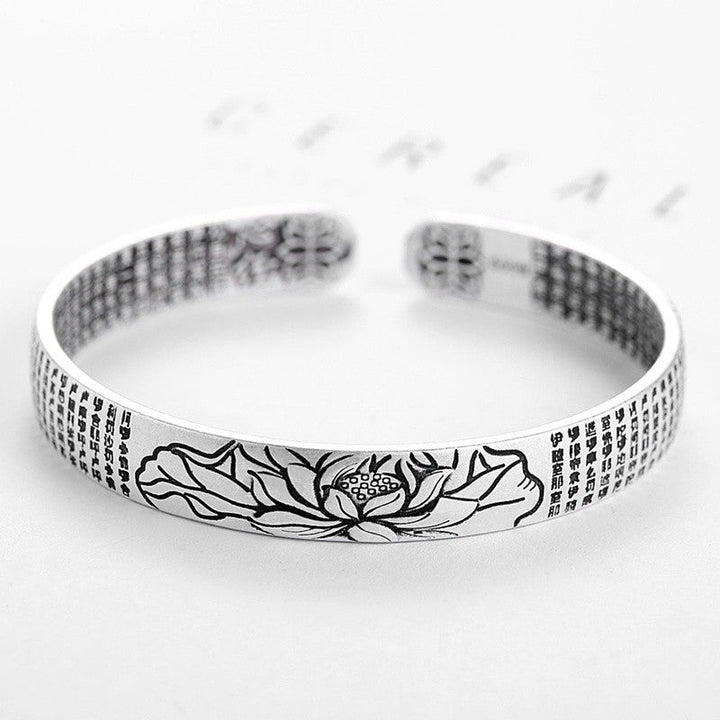 Beautiful women's silver bracelet with lotus design, embodying tranquility and elegant style.