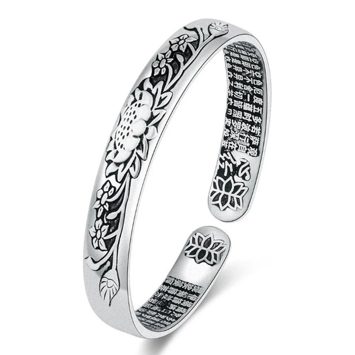 Shimmering silver lotus bracelet for women, offering elegance and a touch of tranquility.