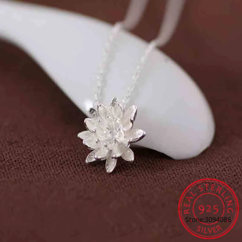 Elegant sterling silver lotus flower pendant necklace for women. Delicate, nature-inspired design, ideal silver jewelry gift.