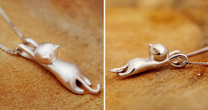 Stylish women's playful cat pendant necklace in sterling silver. Cute animal jewelry, a unique gift for her.