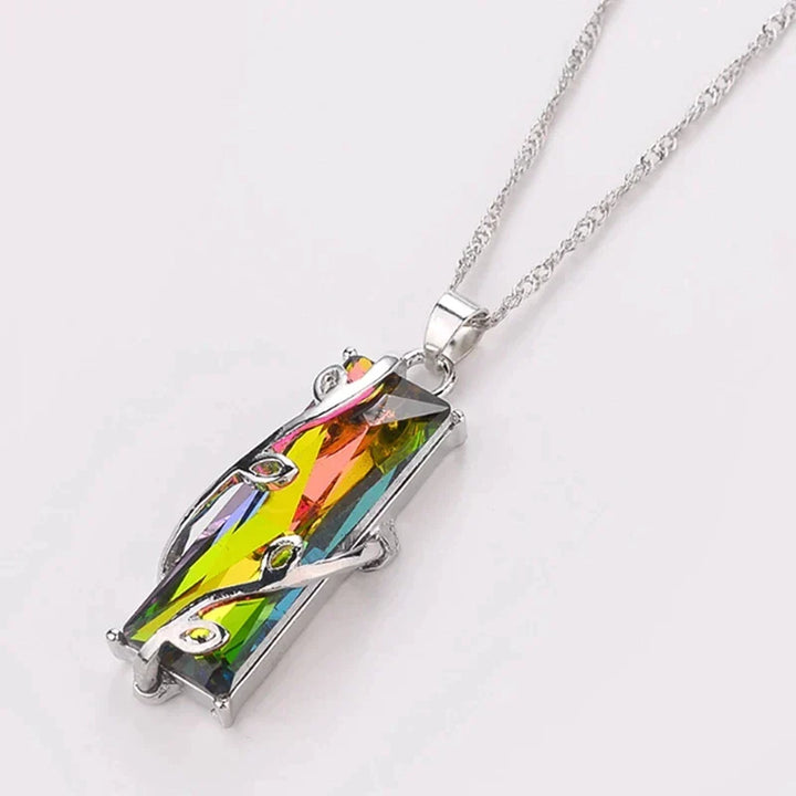 Gift-ready Tree of Life pendant necklace for women, sterling silver with rainbow stones, promoting chakra balance.