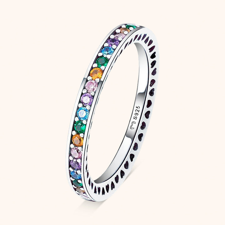 Women's sterling silver rainbow zirconia ring, a colorful band perfect for stacking or as a gift.