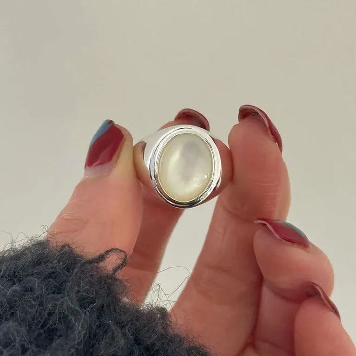 Natural mother of pearl set in a versatile sterling silver ring for women's elegant style.