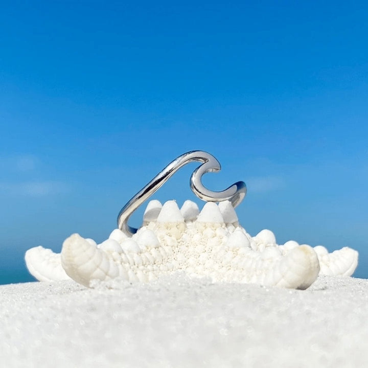 Women's sterling silver sea wave ring, an elegant nature-inspired jewelry piece for daily wear.