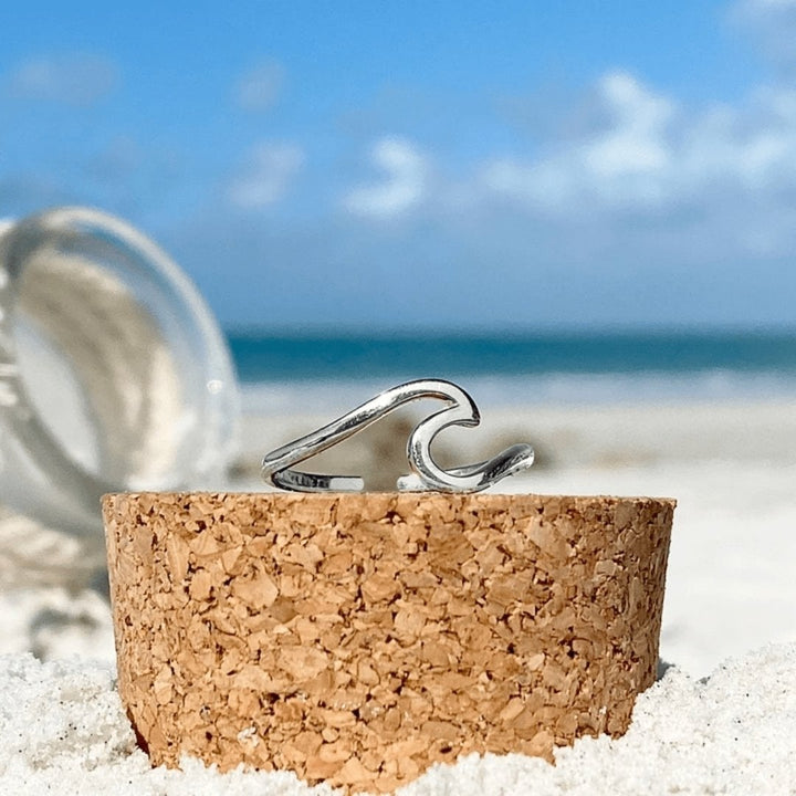 Close-up of an elegant sterling silver ocean wave ring, perfect for women who love sea-inspired jewelry.
