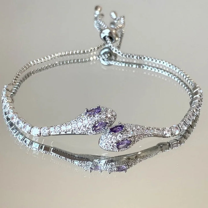 Sparkling women's silver snake bracelet adorned with zirconia stones, a perfect elegant gift for her.