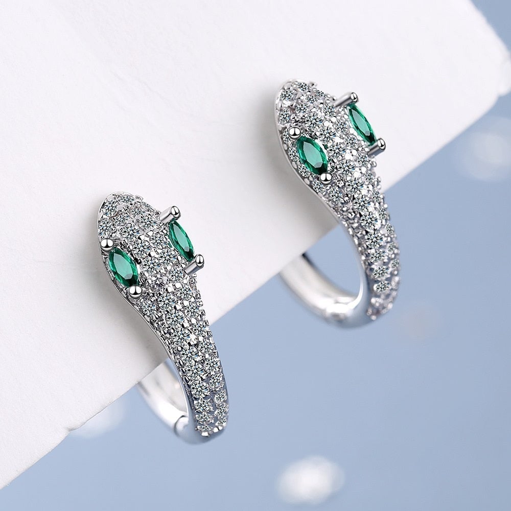 Women's Sterling Silver snake earrings, handcrafted with a unique and bold design. Elegant animal jewelry.