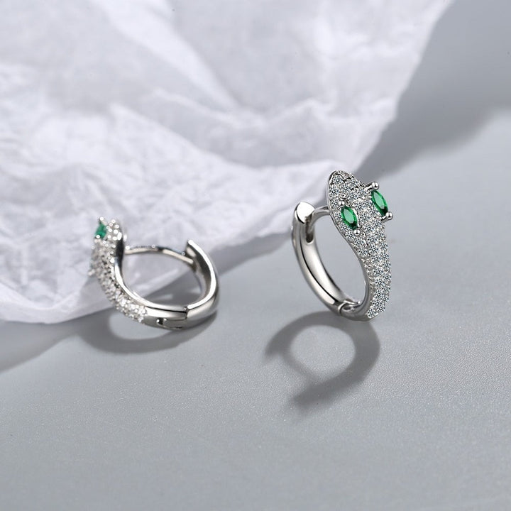 Unique Sterling Silver snake earrings for women. Handcrafted animal jewelry with a bold, eye-catching design.