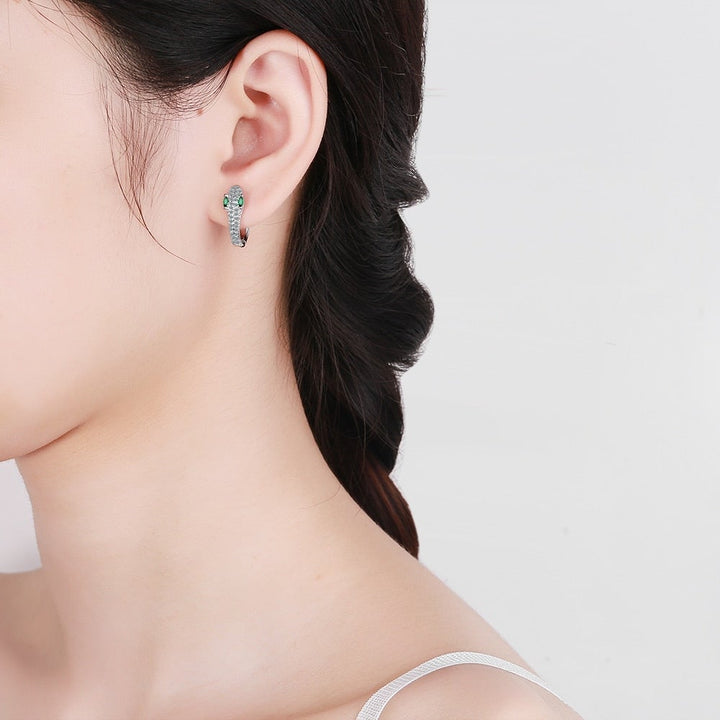 Women's handcrafted Sterling Silver snake earrings. Bold and unique design, perfect animal jewelry statement.