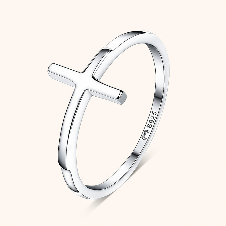 Women's sterling silver spiritual cross ring, a meaningful jewelry piece.