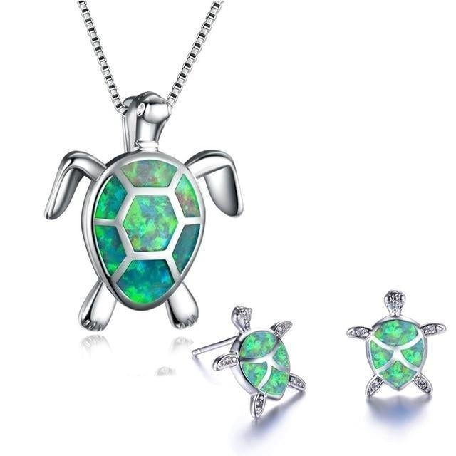 Women's animal jewelry set: sterling silver turtle necklace and sparkling opal earrings.