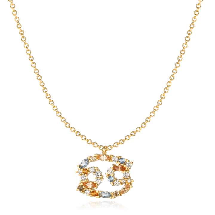 Woman wearing a stylish sterling silver zodiac necklace.