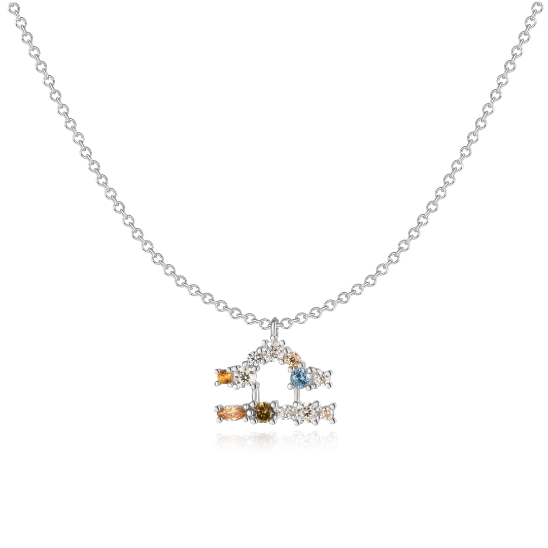 Celestial sterling silver zodiac necklace presented in a gift box.