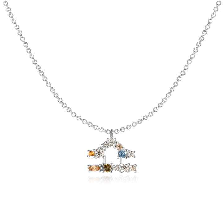 Celestial sterling silver zodiac necklace presented in a gift box.
